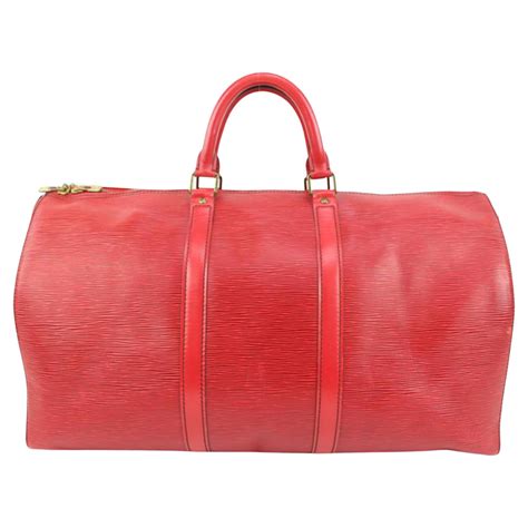 red epi bandouliere duffle.